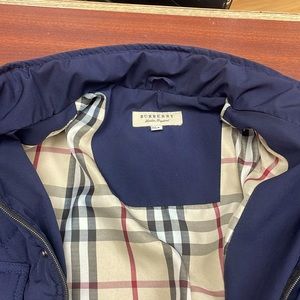 Limited adition Burberry men’s puffer jacket  in navy blue colour size L